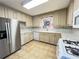 Bright kitchen features stainless steel appliances and ample cabinetry at 363 Seminole Ne Dr, Marietta, GA 30060
