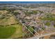 Aerial view showing a house on a large lot with surrounding trees and fields at 12524 Highway 36, Covington, GA 30014