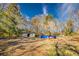 Large backyard features a shed, pool and ample green space at 12524 Highway 36, Covington, GA 30014
