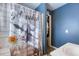 Bathroom includes a tiled shower/tub, toilet, and large window at 12524 Highway 36, Covington, GA 30014