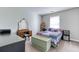 Bedroom with a queen bed and vintage vanity at 12524 Highway 36, Covington, GA 30014