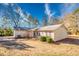 Well-maintained single-story home featuring a classic design, manicured lawn, and cozy curb appeal at 12524 Highway 36, Covington, GA 30014