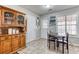 Eat-in kitchen with a large hutch, tile floors, and natural lighting at 12524 Highway 36, Covington, GA 30014
