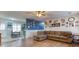 Inviting living area with hardwood floors, comfortable seating, and natural light at 12524 Highway 36, Covington, GA 30014