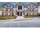 Two-story apartment building with brick and siding exterior at 3102 Fairington Village Dr, Lithonia, GA 30038