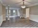 Spacious dining room with hardwood floors and columns at 591 Paper Ridge Ct, Lawrenceville, GA 30046