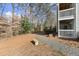 Backyard view of pathway, stone bench and natural setting at 2042 Brian Way, Decatur, GA 30033