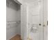 Bright bathroom featuring white fixtures, tile floors, and updated shower at 2042 Brian Way, Decatur, GA 30033