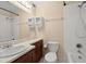 Bathroom features a vanity, toilet, and shower-tub combination at 2042 Brian Way, Decatur, GA 30033