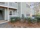 Exterior view of building, showing landscaping and individual unit entrance at 2042 Brian Way, Decatur, GA 30033