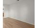 Light-filled living room featuring wood-look flooring and neutral walls at 2042 Brian Way, Decatur, GA 30033