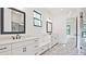 Double vanity bathroom with white cabinets and quartz countertop at 2346 East Maddox Rd, Buford, GA 30518