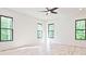 Bright bedroom with hardwood floors and large windows at 2346 East Maddox Rd, Buford, GA 30518