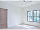 Light-filled bedroom with walk-in closet and hardwood floors at 2346 East Maddox Rd, Buford, GA 30518