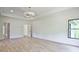 Bright bedroom featuring hardwood floors and large windows at 2346 East Maddox Rd, Buford, GA 30518