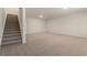 Spacious unfinished basement with carpeted floor at 6996 Fringe Flower Dr # 84, Austell, GA 30168