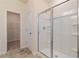 Bathroom with a large shower, tile floor and closet access at 6996 Fringe Flower Dr # 84, Austell, GA 30168