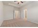 Spacious bedroom with carpet, ceiling fan and access to bathroom and closet at 6996 Fringe Flower Dr # 84, Austell, GA 30168