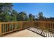 Elevated wooden deck overlooking a wooded area at 6996 Fringe Flower Dr # 84, Austell, GA 30168