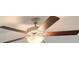 Close-up of a ceiling fan with light kit at 75 Barge Ln, Covington, GA 30016