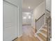 Light and airy entryway with hardwood floors and a staircase at 75 Barge Ln, Covington, GA 30016