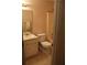 Bathroom with toilet, sink, and shower/tub combo at 410 Raven Dr, Canton, GA 30115