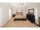 Spacious Primary bedroom with king bed and ensuite access at 208 Magnaview Dr, Mcdonough, GA 30253