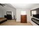 Spacious bedroom with a large bed, dresser, and plenty of floor space at 208 Magnaview Dr, Mcdonough, GA 30253