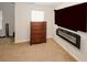 Bedroom with a dresser, TV and electric fireplace at 208 Magnaview Dr, Mcdonough, GA 30253