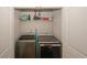 Convenient laundry room with washer and dryer, and additional storage at 208 Magnaview Dr, Mcdonough, GA 30253