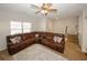 Comfortable living room with sectional sofa and view of stairs at 208 Magnaview Dr, Mcdonough, GA 30253