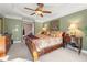 Spacious main bedroom with king-size bed and ceiling fan at 2827 Overlook Ne Trce, Atlanta, GA 30324