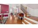 Hardwood staircase with open railing and hardwood floors at 2827 Overlook Ne Trce, Atlanta, GA 30324