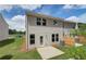 Townhouse backyard with patio and wooden fence at 328 Navigator Ln, Mcdonough, GA 30253