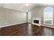 Living room features hardwood floors and a fireplace at 341 Harris Ave, Locust Grove, GA 30248