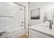 Bathroom with white subway tiles, a soaking tub and double vanity at 475 Rose Garden Ln, Alpharetta, GA 30009