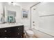 Modern bathroom with white subway tile, marble vanity, and a glass shower at 475 Rose Garden Ln, Alpharetta, GA 30009