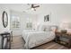 Bright bedroom with a king-size bed and plenty of natural light at 475 Rose Garden Ln, Alpharetta, GA 30009