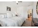 Spacious bedroom with king bed, and access to another room at 475 Rose Garden Ln, Alpharetta, GA 30009