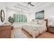 Main bedroom with king bed, and plenty of natural light at 475 Rose Garden Ln, Alpharetta, GA 30009