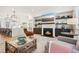 Spacious living room featuring a fireplace and an open floor plan at 475 Rose Garden Ln, Alpharetta, GA 30009