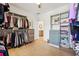 Spacious walk-in closet with custom shelving and drawers at 475 Rose Garden Ln, Alpharetta, GA 30009