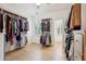 Large walk-in closet with ample shelving and hanging space at 475 Rose Garden Ln, Alpharetta, GA 30009