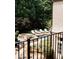 Backyard oasis with pool, hot tub, lounge chairs and mature trees offering privacy at 923 Little Darby Ln, Suwanee, GA 30024
