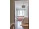 Bright bedroom featuring a comfortable sitting area with natural lighting at 923 Little Darby Ln, Suwanee, GA 30024