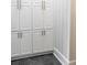 Stylish closet featuring floor-to-ceiling built-in shelving and storage solutions at 923 Little Darby Ln, Suwanee, GA 30024