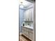 Well-organized pantry with custom cabinets, providing ample storage and a touch of elegance at 923 Little Darby Ln, Suwanee, GA 30024