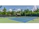 Well-maintained tennis courts with surrounding fence at 923 Little Darby Ln, Suwanee, GA 30024