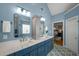 Elegant bathroom with dual vanities, quartz countertops, and a large shower at 107 Watson Se Cir, Atlanta, GA 30317