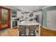 Modern kitchen with white cabinets, granite island and stainless steel appliances at 107 Watson Se Cir, Atlanta, GA 30317